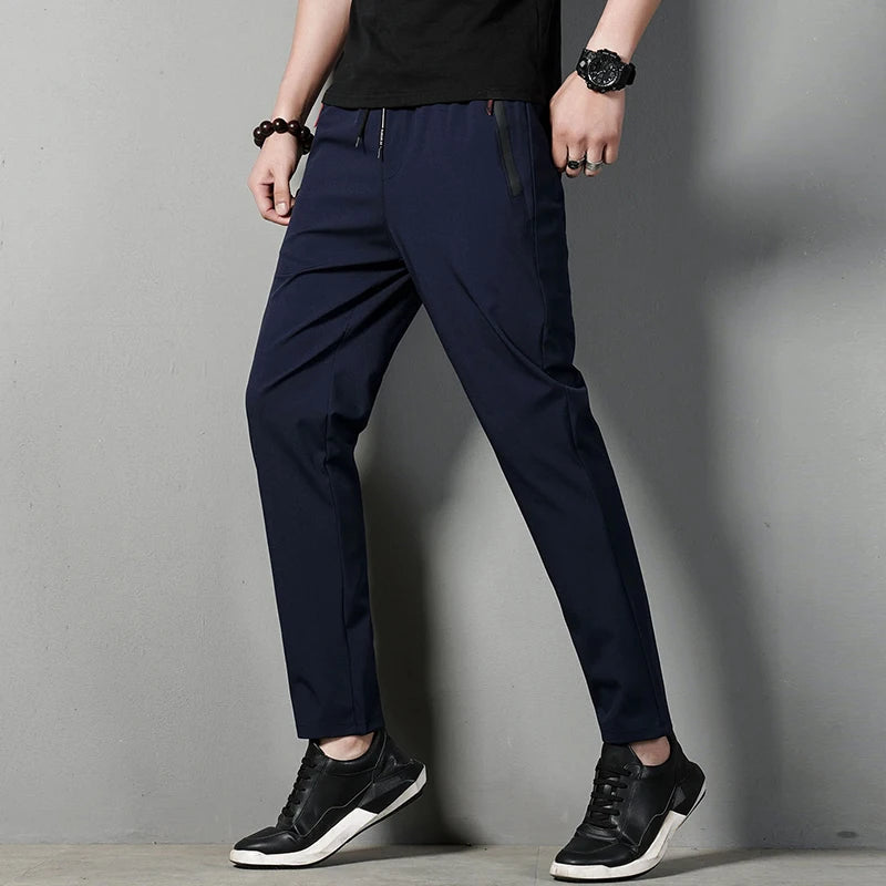 Summer men's casual pants slim fit thin Korean version ice silk pants Jinlun sports pants straight tube quick drying pants