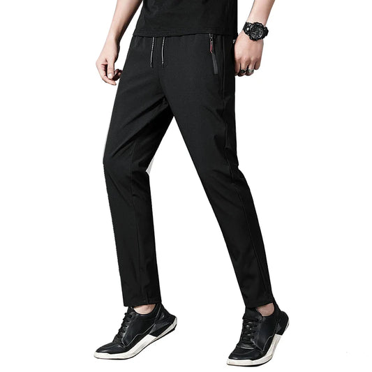 Summer men's casual pants slim fit thin Korean version ice silk pants Jinlun sports pants straight tube quick drying pants