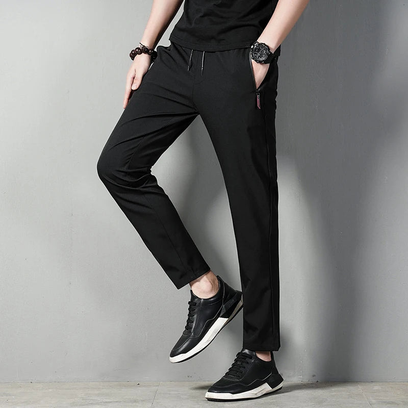 Summer men's casual pants slim fit thin Korean version ice silk pants Jinlun sports pants straight tube quick drying pants