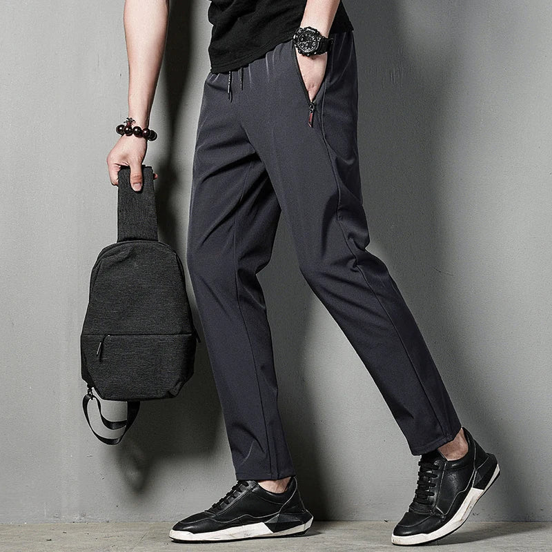 Summer men's casual pants slim fit thin Korean version ice silk pants Jinlun sports pants straight tube quick drying pants