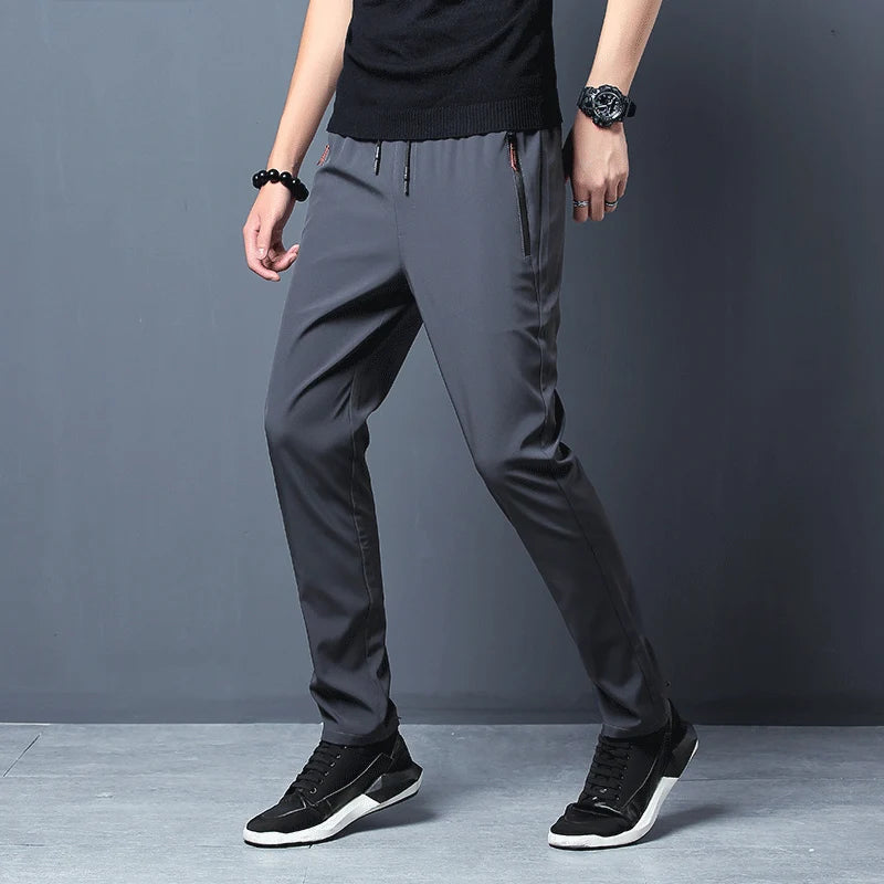 Summer men's casual pants slim fit thin Korean version ice silk pants Jinlun sports pants straight tube quick drying pants