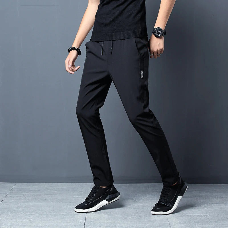 Summer men's casual pants slim fit thin Korean version ice silk pants Jinlun sports pants straight tube quick drying pants